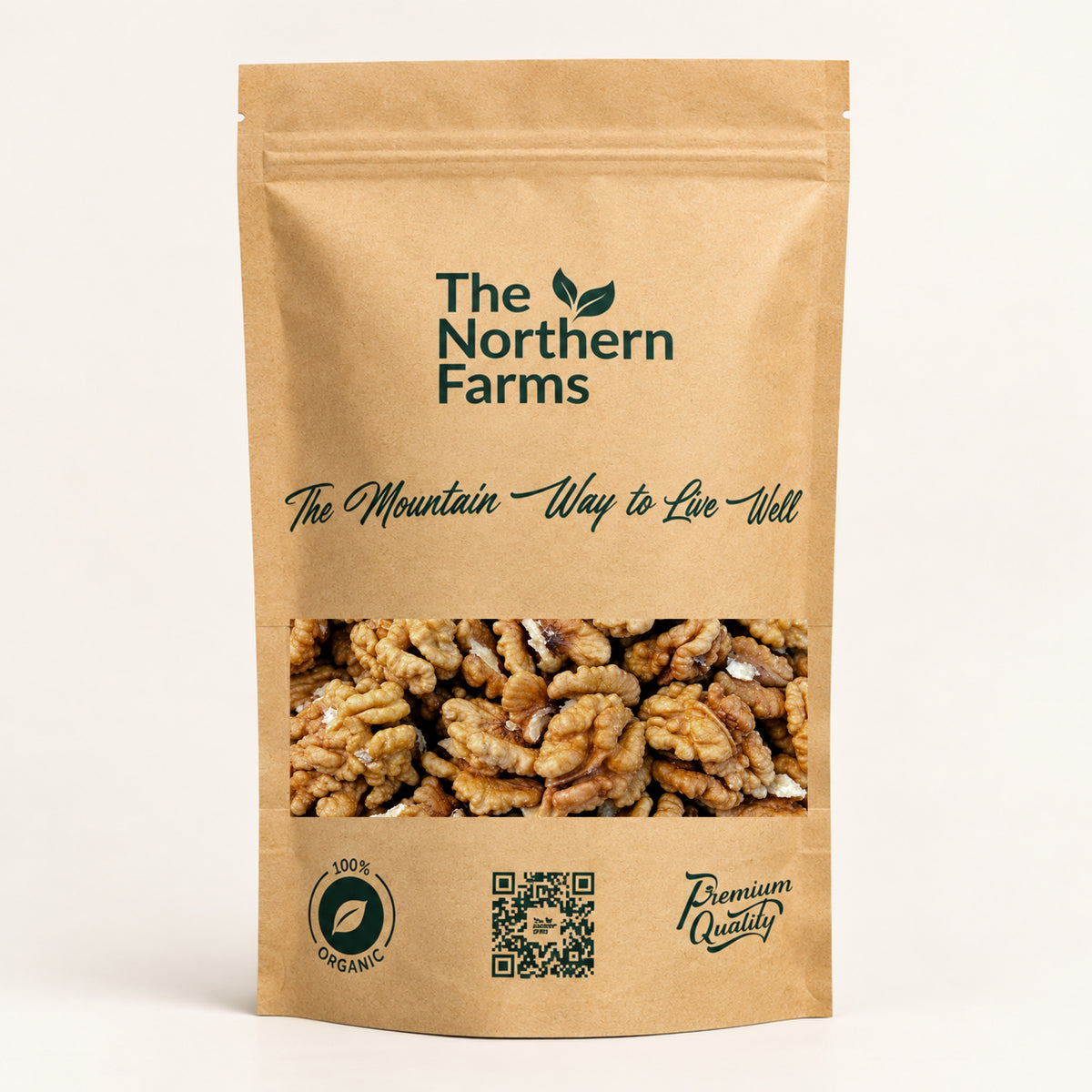 A stand-up kraft paper pouch of walnuts from The Northern Farms, featuring a clear window showing the walnuts inside, on a clean off-white background.